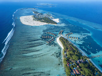 Maldives, Kaafu Atoll, Aerial view of Huraa island - KNTF05876