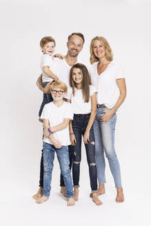 Happy family with children against white background - SDAHF00989