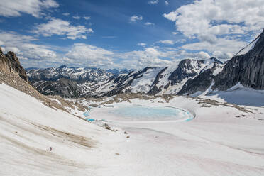 Person crossing ground, Bugaboo Property Released (PR)ovincial Park, British Columbia, Canada - ISF24313