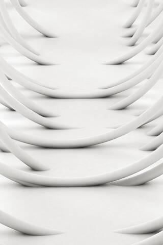 Studio shot of white arched tubes stock photo