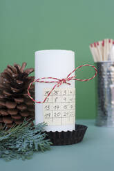 Advent calendar on white decorated candle - GISF00716