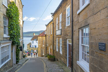 View of old coast guard station from King Street in Robin Hood's Bay, North Yorkshire, England, United Kingdom, Europe - RHPLF18885