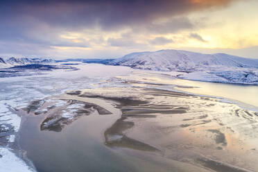 Aerial view of cold sea framed by snow capped mountains at sunset, Tanamunningen Nature Reserve, Leirpollen, Finnmark, Arctic, Norway, Scandinavia, Europe - RHPLF18978