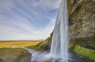 A spectacular sheer waterfall, Seljalandsfoss Falls, near Vik, near the south coast of Iceland, Polar Regions - RHPLF19021