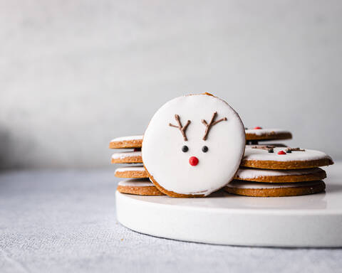 Homemade Christmas cookies with reindeer decoration stock photo