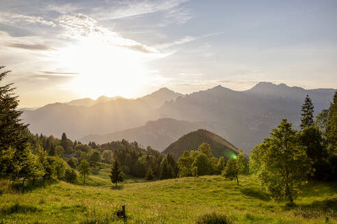 Scenic view of mountain range during sunset at Lake Idro, Lombardy, Italy - MAMF01491