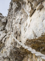 Abseilen vom steilen Felsen in den Sextner Dolomiten - HUSF00166