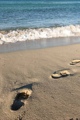 Footprints in beach sand - EGBF00546