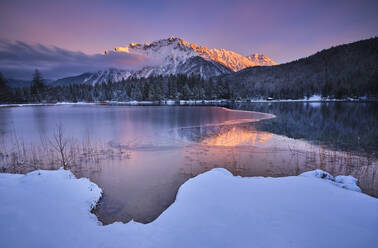 Scenic view of Lautersee lake with Karwendel mountain during sunset - MRF02420