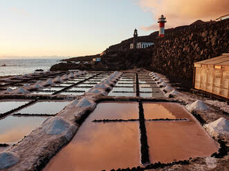 Amazing scenery of salt flats located near sea at sunset in La Palma in Spain - ADSF19689
