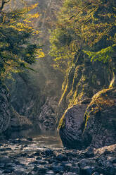 Khosta River flowing between rocks in Devils Gate canyon - KNTF06094