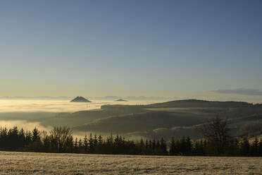 Clear sky over volcanic landscape of Hegau at dusk, Baden-Wurttemberg, Germany - ELF02332