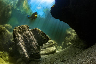 Teenage girl scuba diving in Traun river - YRF00262