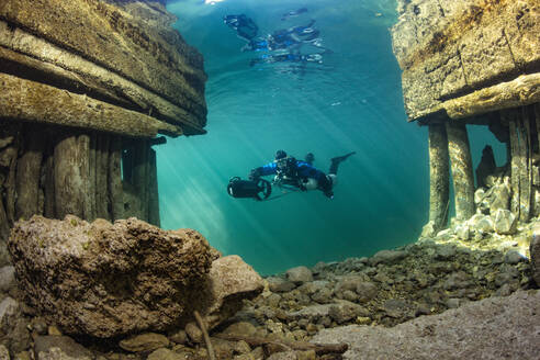 Scuba diver exploring Lake Atter with diver propulsion vehicle - YRF00265