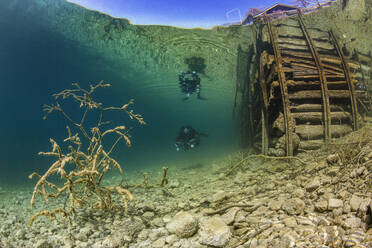 Scuba diver exploring Lake Atter - YRF00266