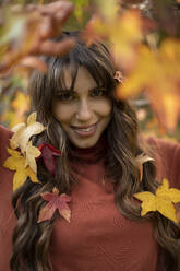 Beautiful woman in autumn park - AXHF00050