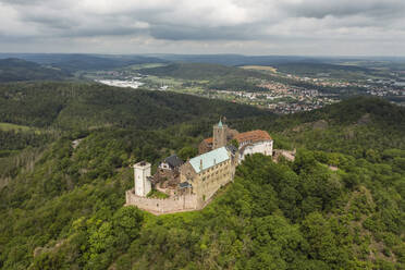 Germany, Thuringia, Eisenach, Aerial view of Wartburg castle - TAMF02728