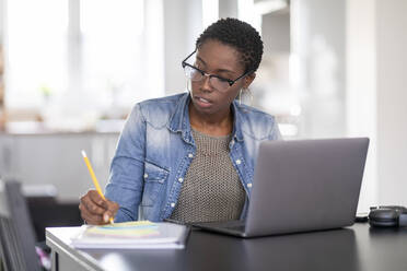 Woman working at home - WPEF03904