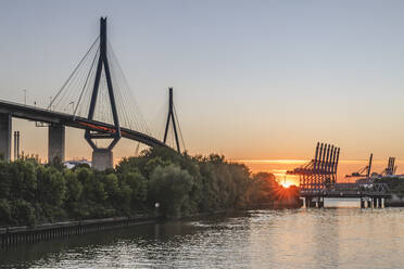 Germany, Hamburg, Kohlbrand Bridge at sunset - KEBF01735