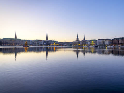 Germany, Hamburg, Inner Alster, Lake and city view with Christmas decorations stock photo