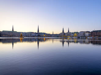 Germany, Hamburg, Inner Alster, Lake and city view with Christmas decorations - RJF00847