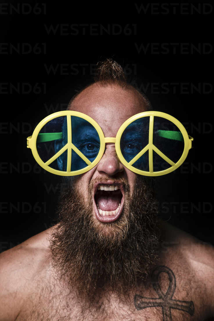 Bearded Man Hipster Brutal Male With Beard And Moustache In Vintage Biker  Or Pilot Sunglasses Throws Paper Plane On Wooden Background Stock Photo,  Picture and Royalty Free Image. Image 67317761.