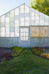 Exterior of dilapidated abandoned greenhouse. - MINF15577