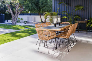 Chairs and table arranged in patio - DLTSF01545