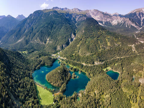 Austria, Tyrol, Lake Samerangersee, Lake Fernsteinsee Aerial view of lake and mountains stock photo