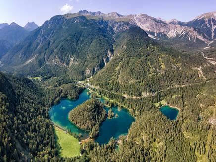 Austria, Tyrol, Lake Samerangersee, Lake Fernsteinsee Aerial view of lake and mountains - YRF00270