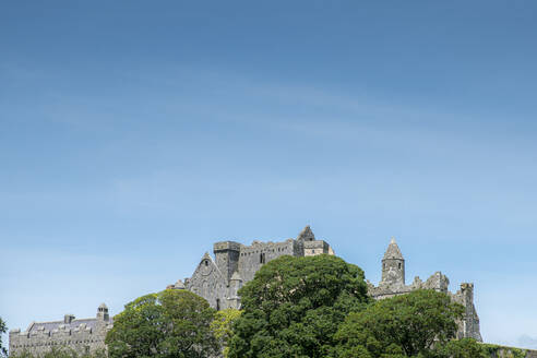 Rock of Cashel against clear blue sky during sunny day, Tipperary, Ireland - BIGF00073