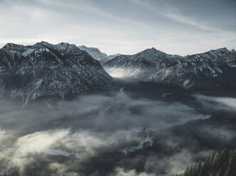 Germany, Bavaria, Ammergau Alps, Teufelstattkopf, Mountains on winter day - RBF08058