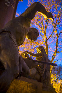 Germany, Berlin, Bismarck Memorial statue of Sigurd forging sword with sibil in background - BIGF00097