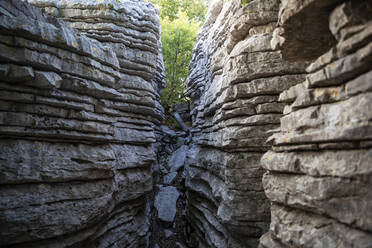 Greece, Epirus, Zagori, Pindos Mountains, Vikos National Park, Passage between rock formations - MAMF01597