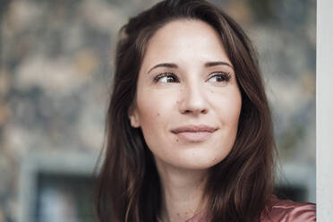 Beautiful female entrepreneur looking away in cafe - JOSEF03067