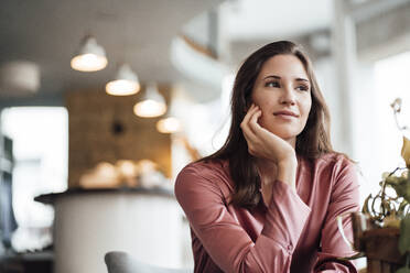 Mid adult businesswoman day dreaming in cafe - JOSEF03069