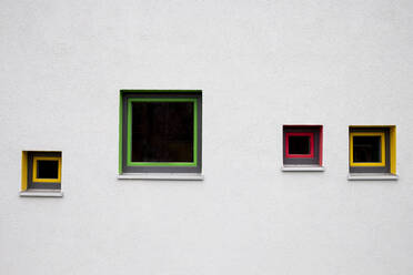 Colored window frames on white wall - HLF01254