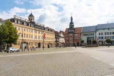 Commercial buildings and offices by St George Church against cloudy sky at Eisenach, Germany - TAMF02854