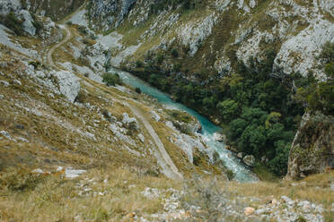 Cares trail by flowing river at Picos De Europe National Park, Asturias, Spain - DMGF00431