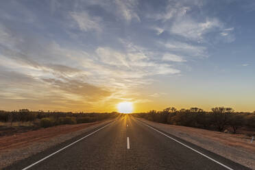 Empty Lasseter Highway at sunrise , Australia - FOF12038