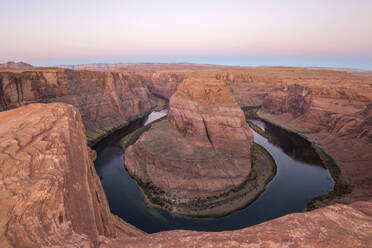 View from cliff edge over the Colorado River at Horseshoe Bend, dawn, Glen Canyon National Recreation Area, Page, Arizona, United States of America, North America - RHPLF19121