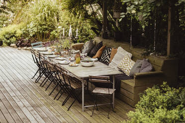 Table arranged with food for garden party - MASF21754