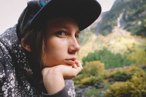 Close up shot of kid on a hike looking bored. - CAVF92527