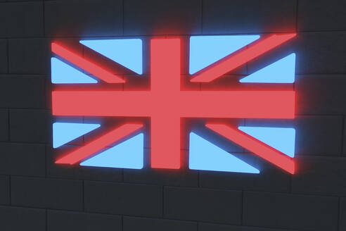 Illuminated British flag on black brick wall - NMCF00027