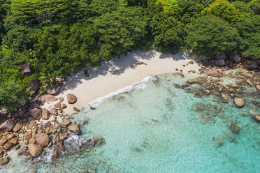 Seychelles, Praslin Island, Aerial view of Anse Lazio sandy beach with crystal clear turquoise ocean - RUEF03158