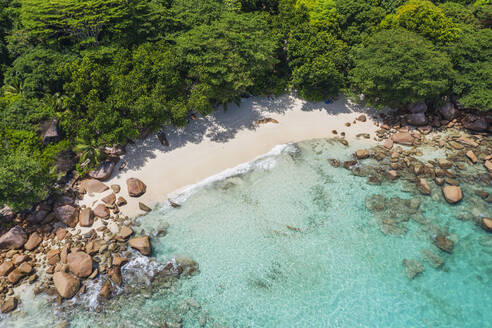 Seychelles, Praslin Island, Aerial view of Anse Lazio sandy beach with crystal clear turquoise ocean - RUEF03158