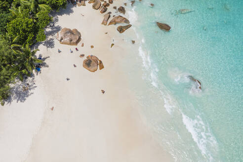 Seychelles, Praslin Island, Aerial view of Anse Lazio sandy beach with crystal clear turquoise ocean - RUEF03161