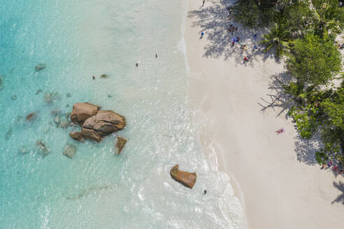 Seychelles, Praslin Island, Aerial view of Anse Lazio sandy beach with crystal clear turquoise ocean - RUEF03162