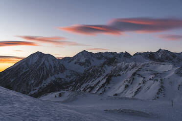 Snowy mountains against sky during sunrise - JAQF00265
