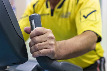 A patient pedals a bicycle during a cardiac rehabilitation program - CAVF92798